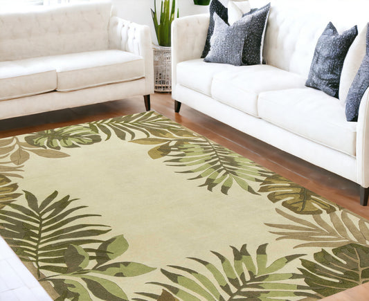 8' X 11' Ivory Hand Tufted Bordered Tropical Leaves Indoor Area Rug