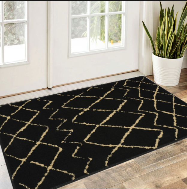 2' X 4' Beige and Black Floral Power Loom Area Rug