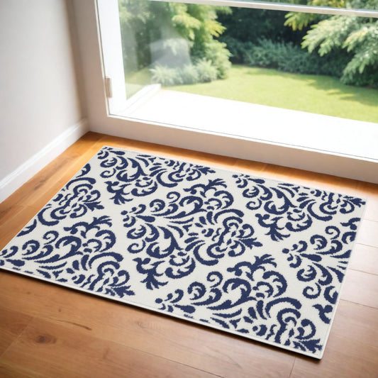 2' X 4' Blue and White Damask Power Loom Area Rug