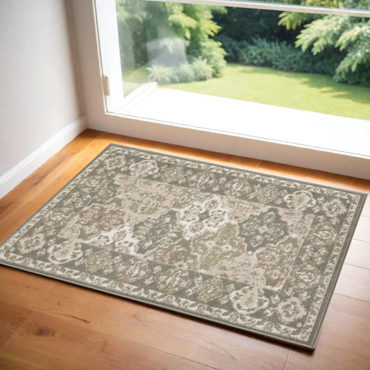 2' X 4' Green and Ivory Ogee Power Loom Distressed Area Rug