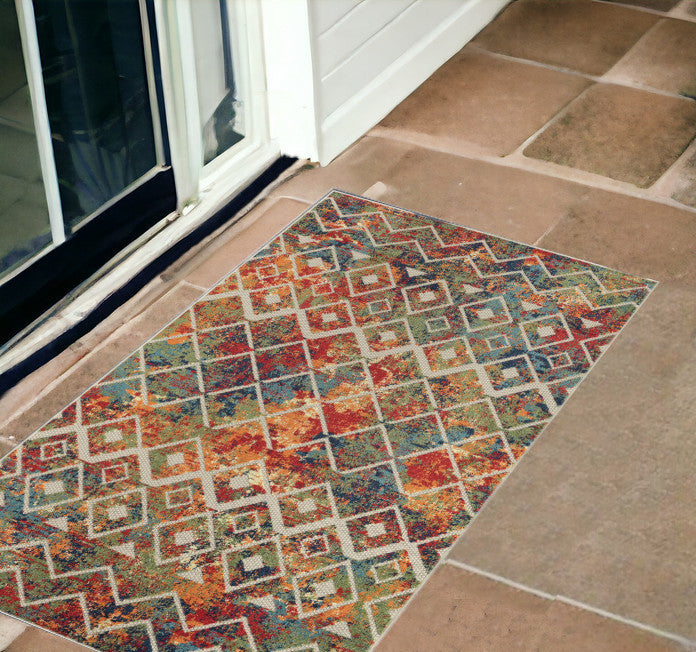 2' X 3' Green Orange and Red Geometric Stain Resistant Indoor Outdoor Area Rug
