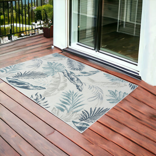 2' X 3' Blue and Serene White Palm Leaf Stain Resistant Indoor Outdoor Area Rug