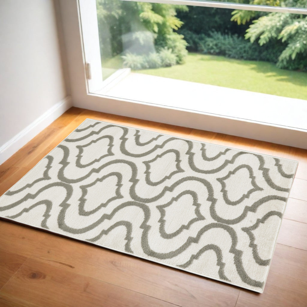 2' X 4' Ivory and Green Trellis Area Rug