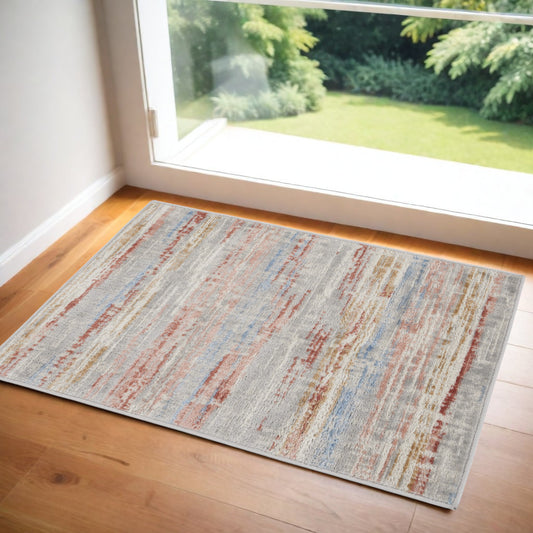2' X 3' Ivory Red and Blue Abstract Non Skid Area Rug