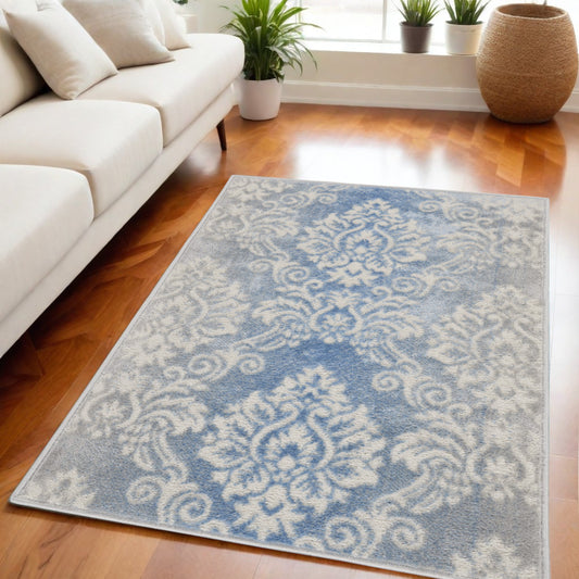 2' X 3' Ivory and Blue Damask Distressed Non Skid Area Rug