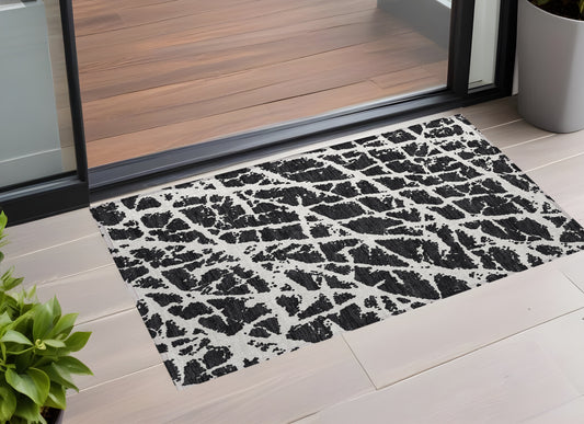 2' X 3' Black and White Abstract Washable Non Skid Indoor Outdoor Area Rug