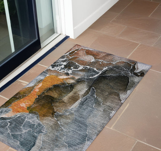 2' X 3' Orange Abstract Washable Non Skid Indoor Outdoor Area Rug