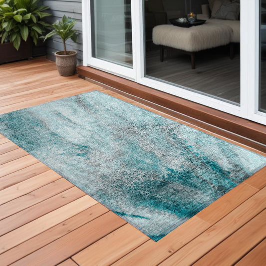 2' X 3' Gray and Ivory Abstract Washable Non Skid Indoor Outdoor Area Rug