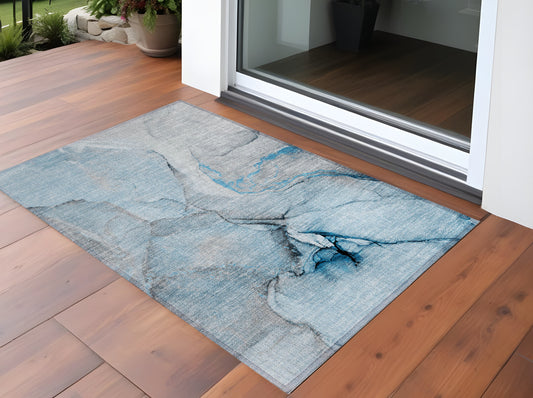 2' X 3' Blue and Ivory Abstract Washable Non Skid Indoor Outdoor Area Rug