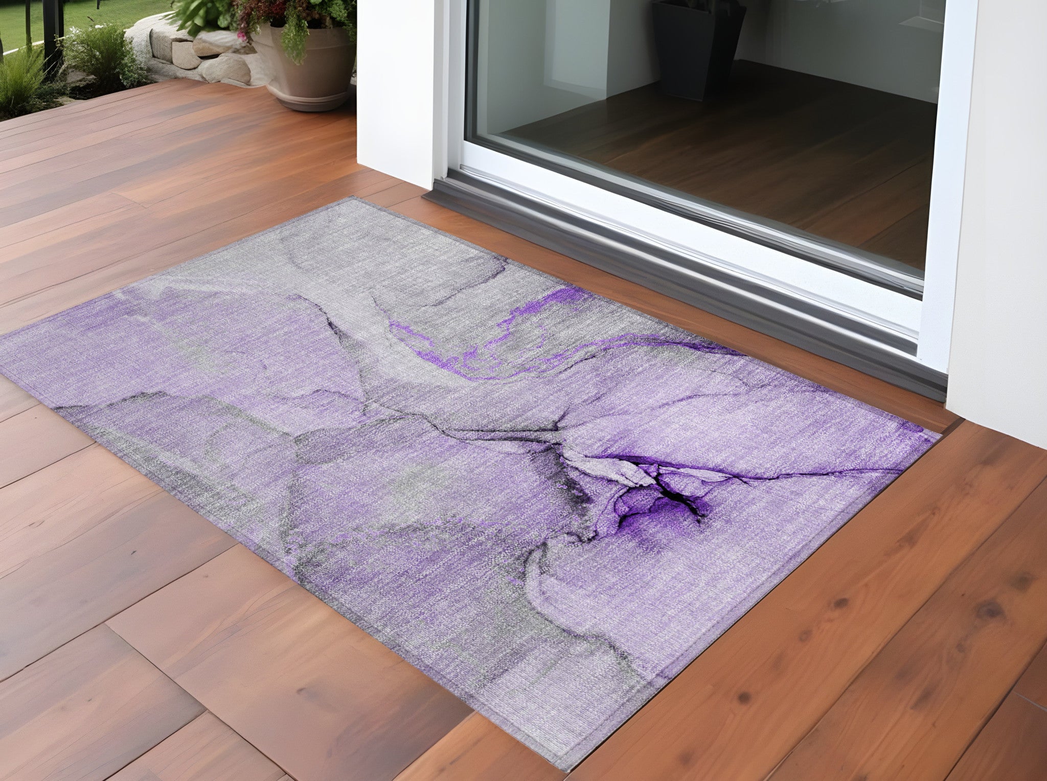 2' X 3' Purple and Ivory Abstract Washable Non Skid Indoor Outdoor Area Rug