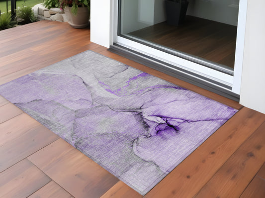 2' X 3' Purple and Ivory Abstract Washable Non Skid Indoor Outdoor Area Rug