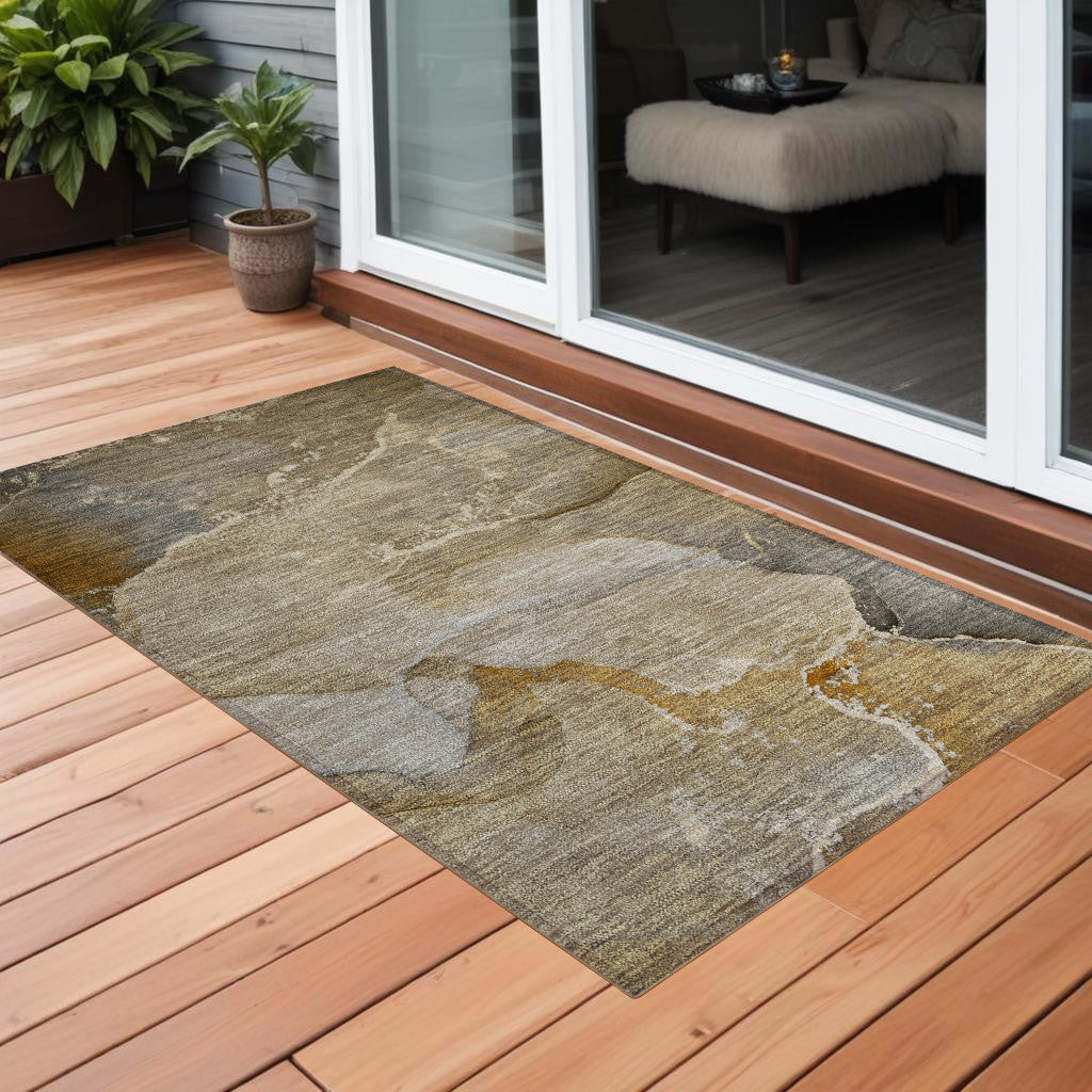 2' X 3' Brown Beige and Gold Abstract Washable Indoor Outdoor Area Rug