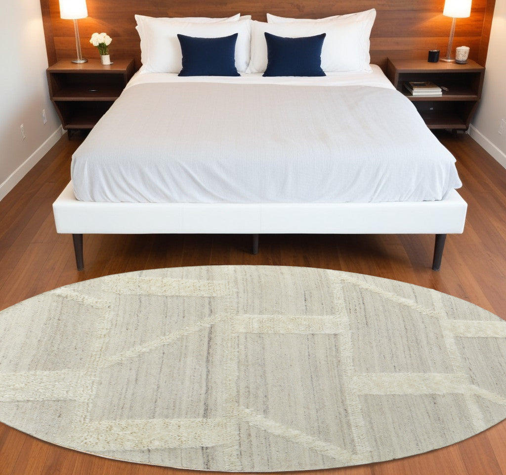 9' Gray and Ivory Wool Geometric Hand Woven Round Rug