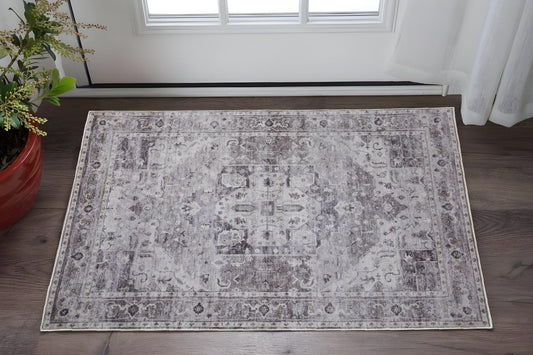 2' X 3' Gray and Ivory Oriental Power Loom Worn Faded Washable Area Rug