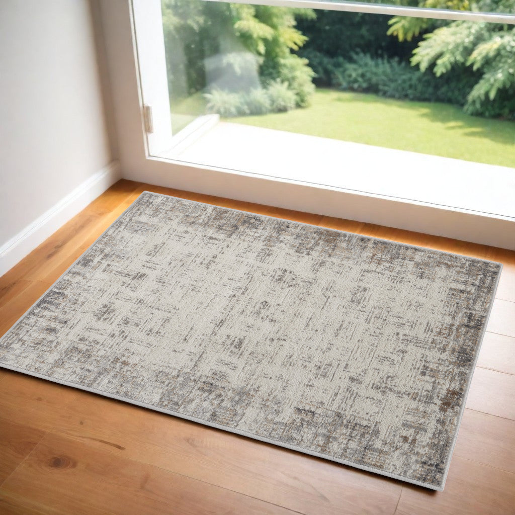 2' X 3' Ivory and Gray Abstract Area Rug