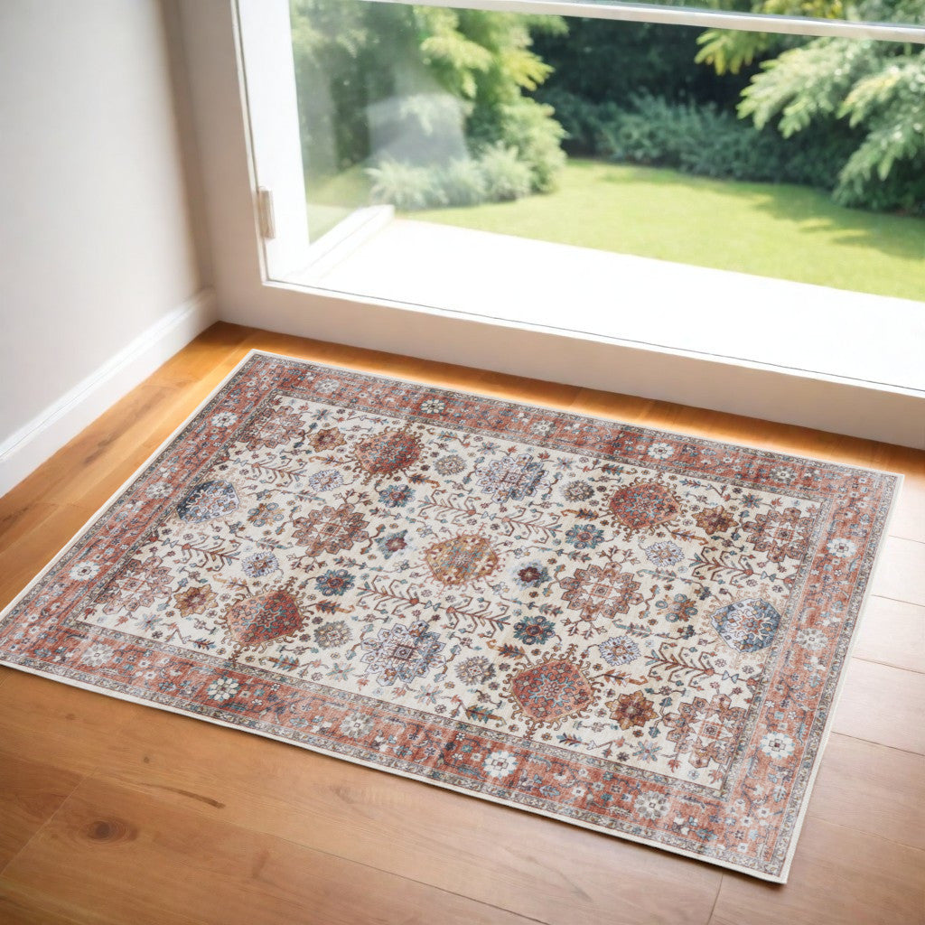 2' X 3' Beige and Orange Oriental Distressed Non Skid Area Rug